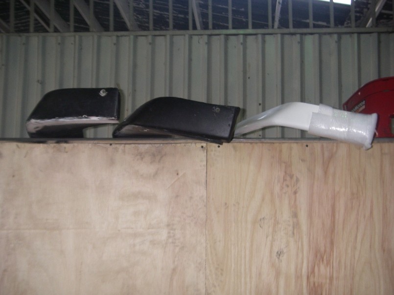 This is a side view of the racing version I make and this one for sale from the USA.  You can see they are the same style but the white one is much more shallow for the street.