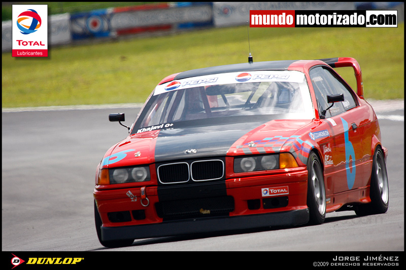 The race one on a very low car will rub under cornering, the street version will not.